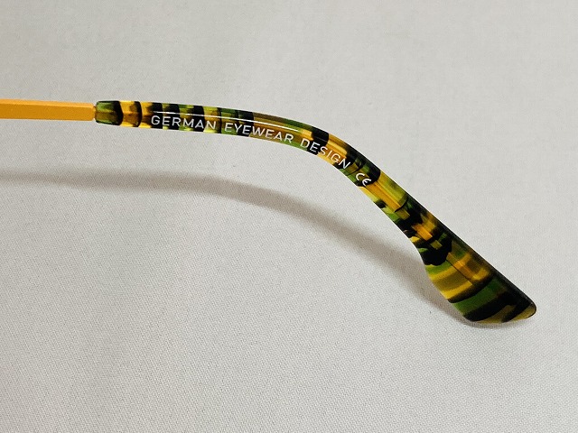 だいだい色のクラウンパントカラフルメガネ（ドイツデザイナーメガネ）