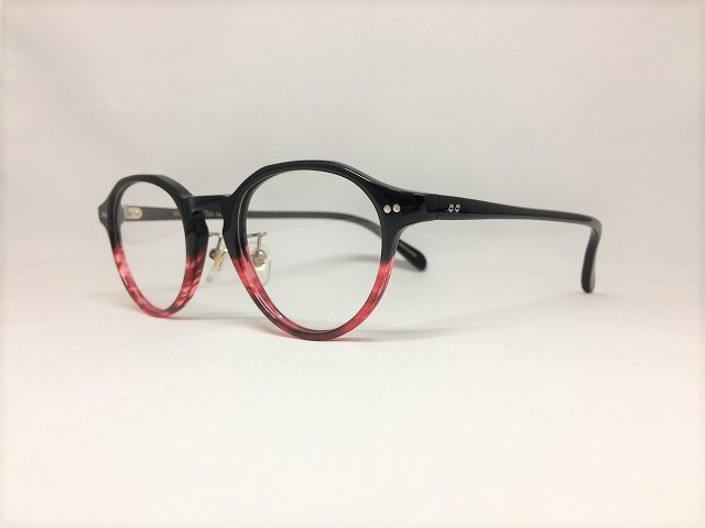 赤と黒の丸いセルロイドメガネ